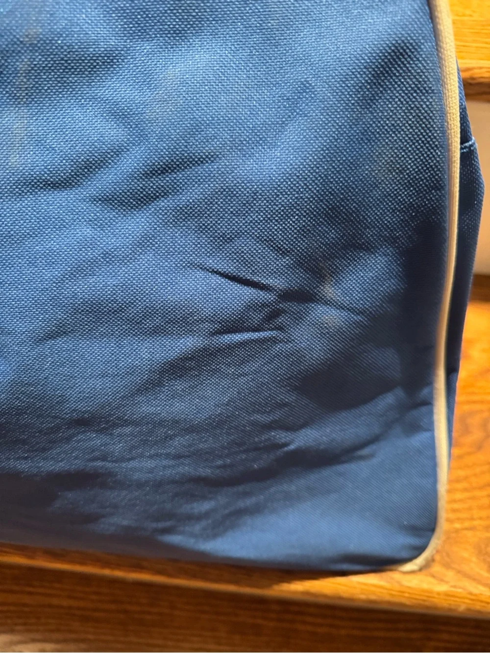 Large blue Chase monogrammed zippered bag